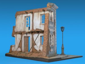 This kit contains 138 parts of a diorama base and ruined building.